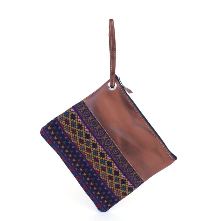 Handwoven Guatemalan textile and geniune leather wristlet. Chic Handwoven Clutch For Daily Use, Brown Adjustable Bags With Wrist Strap, Traditional Brown Pouch For Everyday Use, Travel Woven Brown Pouch, Brown Pouch With Wrist Strap For Daily Use, Travel Brown Woven Pouch, Handwoven Brown Clutch For Travel, Brown Woven Travel Pouch, Adjustable Brown Wristlet For Daily Use