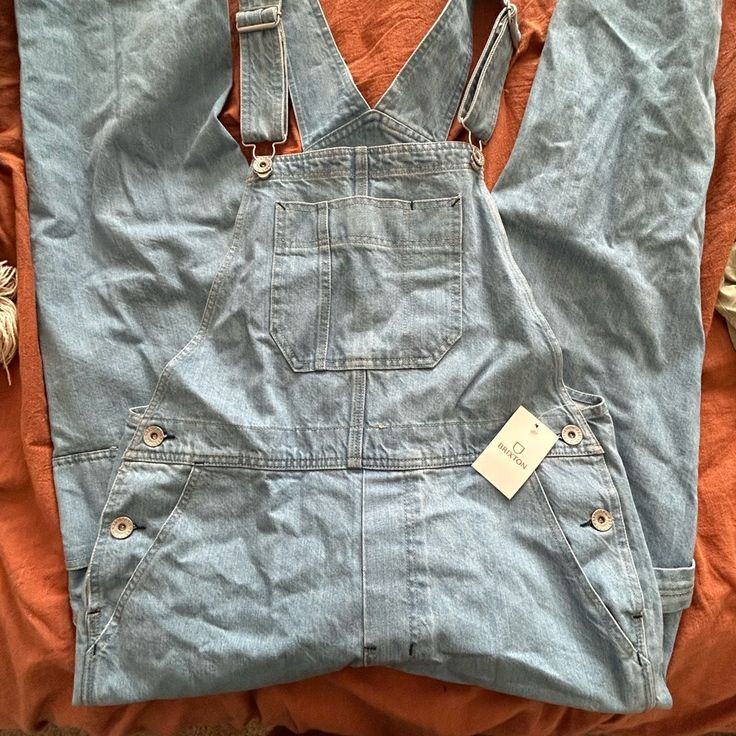 Brixton Bootcut Overalls New With Tags Light Wash Denim Workwear Overalls, Light Wash Denim Overalls For Work, Spring High-rise Utility Overalls, Spring Utility Overall Jeans, Spring Light Wash Overall Jeans, Spring Light Wash Straight Leg Overalls, Blue Utility Overall Jeans, High Rise Washed Blue Denim Overalls, Denim Overalls In Medium Wash