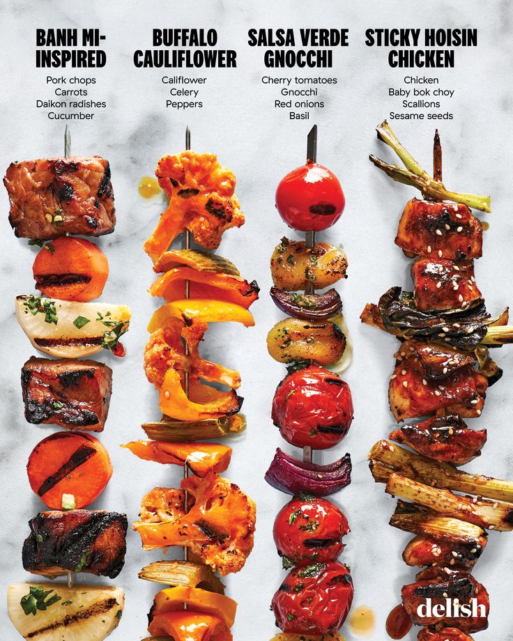 an advertisement for grilled meats on skewers with tomatoes, onions and peppers