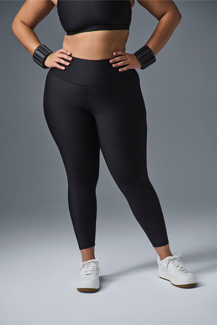 Wondering why these leggings are a fan favorite? Maybe it’s the sculpting, subtly sheeny, high-compression Airlift fabric. Or the fact that they fit like a glove, complete with a wide, double-layered waistband for a holds-you-in feel. Or the ⅞ length hems that are perfect for petites or an above-the-ankle fit. Pick your color and get ready to wear yours on repeat. High Stretch Alo Yoga Leggings, Black Smoothing Athleisure Activewear, Black Alo Yoga Leggings For Pilates, Sleek Tight Black Activewear, Sleek Compression Activewear By Alo Yoga, Sleek Black Tight Activewear, Black Compressive Smoothing Activewear, Alo Yoga High Stretch Solid Leggings, Compressive Black Smoothing Activewear