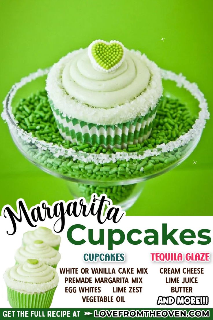 a cupcake with white frosting and green sprinkles on top is in a glass dish