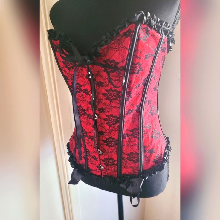 Burlesque Halloween Corset. Size Medium. New Without Tags. Elegant Halloween Party Corset, Halloween Underbust Corset For Night Out, Halloween Night Out Underbust Corset, Underbust Corset For Halloween Night Out, Elegant Halloween Corset For Costume Party, Gothic Red Party Corset, Red Evening Underbust Corset, Red Underbust Corset For Evening, Gothic Corset For Halloween Night Out