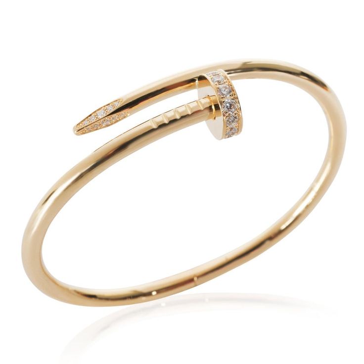 This is part of Chairish’s Fine Jewelry assortment.  Cartier Juste Un Clou Bracelet in 18k Yellow Gold 0.58 CTW   PRIMARY DETAILS   SKU: 140248   Listing Title: Cartier Juste Un Clou Bracelet in 18k Yellow Gold 0.58 CTW   Condition Description: Translating to 'just a nail', the Juste Un Clou collection from Cartier is one of the Maison's most celebrated styles. The collection was born in the '70s and represented the brand's edgier side and flair for unique design.       Retails for 13300 USD. In excellent condition. 16 cm in length. Comes with Box;Certificate of Authenticity;Original Receipt;   Brand: Cartier   Collection/Series: Juste Un Clou   Metal Type: Yellow Gold   Metal Purity: 18k   Chain or Bracelet Length (in): 16   Pre-Owned Jewelry Condition: Excellent   SIDE STONE INFORMATION Cartier Nail Bracelet, Cartier Juste Un Clou Bracelet, Juste Un Clou Bracelet, Cartier Juste Un Clou, Contemporary Bracelets, Nail Bracelet, Gold Rings Fashion, Diamond Carat, Leather Wrap Bracelet