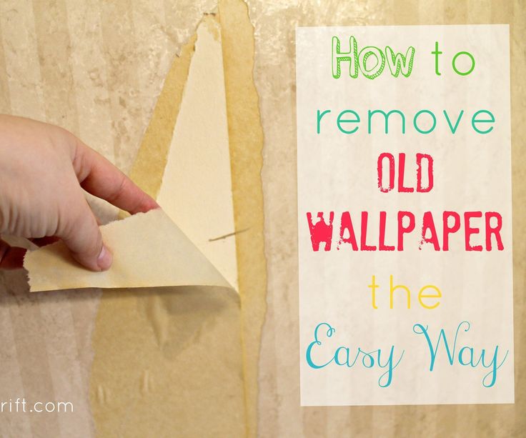 someone is removing old wallpaper from the wall with an easy way to remove it