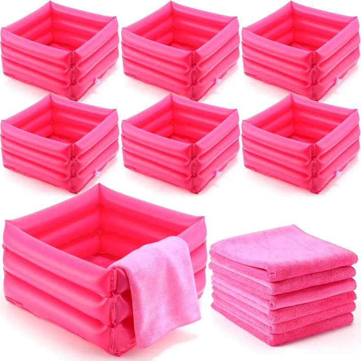 six pink storage bins with one folded and the other rolled up in different positions