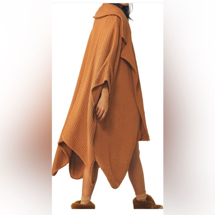 Poncho Waffle Jacket In Brown Almond Spring Batwing Sleeve Solid Outerwear, Oversized Long Brown Outerwear, Cozy Brown Outerwear One Size, One Size Spring Cape Outerwear, Oversized Beige Cape Outerwear, Brown Spring Cape Outerwear, Fall Outerwear With Batwing Sleeve For Layering, Oversized Batwing Sleeve Outerwear For Fall, Fall Outerwear For Layering With Batwing Sleeve