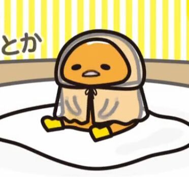 a cartoon character sitting on top of a bed