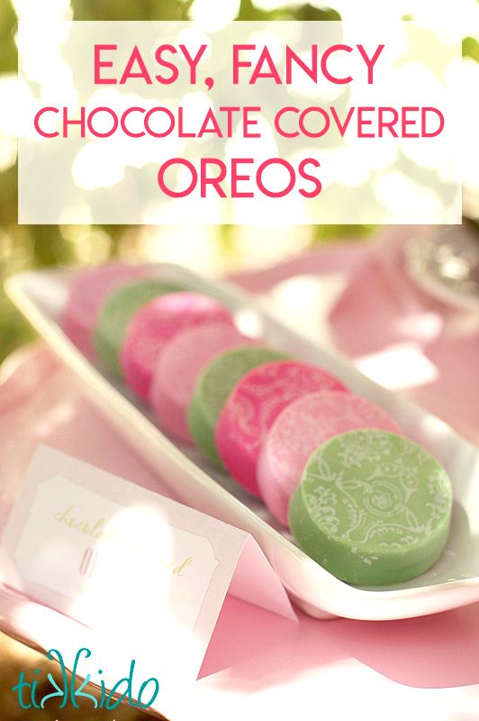 there is a plate with different colored cookies on it and the words easy fancy chocolate covered oreos