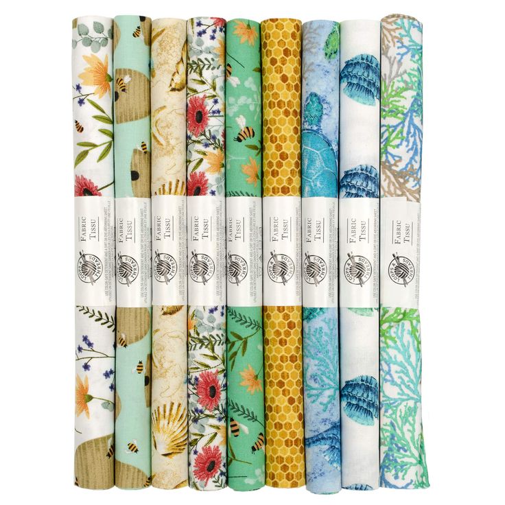 six different types of paper with flowers and leaves on them, all lined up in rows