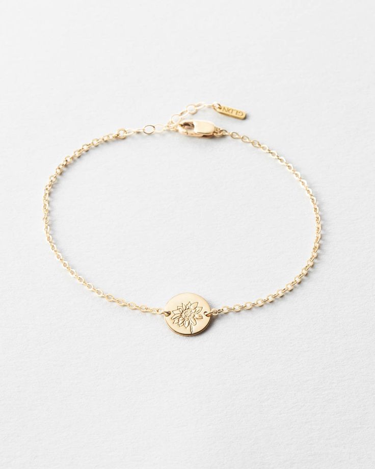 Flowers are our love language — which one speaks to you? Wrap your wrist with a beloved bloom (and carry it with you always)! This suspended, hand-stamped pendant always stays perfectly in place, like magic. Explore the whole garden: Flora Collection Small Bracelets, Love Language, Hand Of Cards, Made In Heaven, Recycled Gold, Floral Cards, Pure Gold, Real Gold, Gold Material