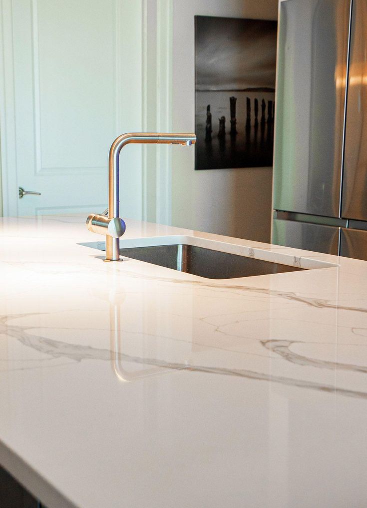 the kitchen counter is clean and ready for us to use in its new owner's home