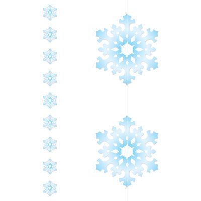 three snowflakes hanging from strings on a white background