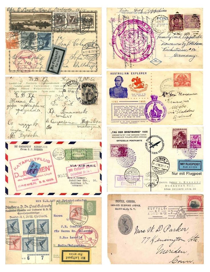 several different envelopes with stamps on them