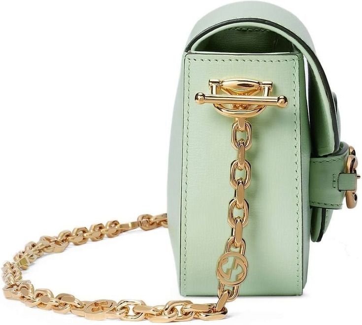 Get ready to turn heads with this elegant mint green leather shoulder bag with signature Horsebit detailing and gold-tone hardware. Secure your belongings with the unique magnetic fastening and stay organized with the main compartment and internal zip pocket. Perfect for any occasion, this luxurious bag is a must-have for adding a touch of style to any outfit. Dimensions: Width: 22.5cm, Height: 13.5cm, Depth: 5.5cm Green Gucci Travel Bag, Gucci Green Crossbody Bag, Green Gucci Crossbody Bag, Green Gucci Bag With Detachable Strap, Gucci Green Shoulder Bag With Detachable Strap, Gucci Green Bag With Detachable Strap, Green Gucci Crossbody Shoulder Bag, Green Gucci Shoulder Bag For Evening, Gucci Green Shoulder Bag For Evening