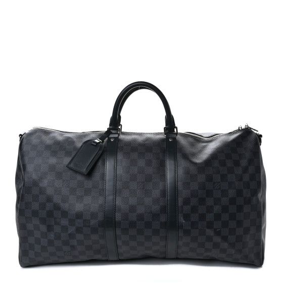 This is an authentic LOUIS VUITTON Damier Graphite Keepall Bandouliere 55. This travel bag is crafted of Louis Vuitton's signature checkerboard coated canvas in black and grey with black leather trim. The bag features black rolled leather top handles and silver hardware.The top zippers open to a black fabric interior. Elegant Monogram Canvas Travel Bag With Leather Trim, Classic Formal Travel Bag In Coated Canvas, Classic Coated Canvas Travel Bag For Formal Occasions, Classic Coated Canvas Travel Bag For Formal Use, Luxury Travel Bag In Signature Coated Canvas, Designer Black Rectangular Travel Bag, Luxury Signature Coated Canvas Travel Bag, High-end Black Coated Canvas Bags, Classic Business Bags In Signature Coated Canvas