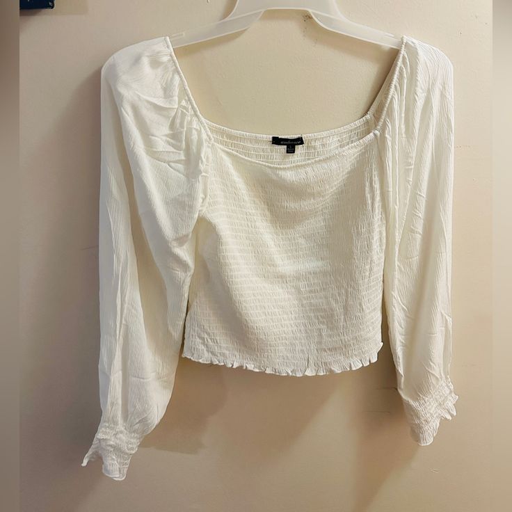 Womens Size: Large Color: White Brand: Ambience Smocked Square Neck Cropped Style Top New, Never Worn, No Tags White Top With Smocked Back For Fall, White Smocked Back Top For Fall, White Smocked Top For Fall, White Smocked Top For Day Out In Fall, Long Sleeve Smocked Top With Smocked Cuffs For Vacation, Long Sleeve Tops With Smocked Bodice For Vacation, Long Sleeve Top With Smocked Bodice For Vacation, White Smocked Top For Fall Day Out, Casual Blouse With Smocked Cuffs For Day Out