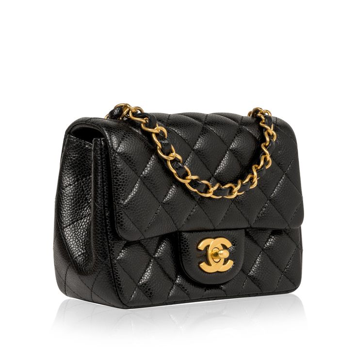 To say we're obsessed with this little Chanel gem here at bagsalora is an understatement. Crafted from black caviar leather and complimented by romantic antique gold-tone hardware, this rare Mini Classic Flap is definitely hard to get your hands on. The perfect accessory for basically anything, this little Chanel is the ideal compliment to any outfit for any occasion. Wear the mini flap with a cocktail dress and a pair of heels, or with black trousers with a silk blouse, or even with a pair of jeans and a basic tee - no matter what, this bag is a suitable companion. A bag you'll wear and love forever, the Classic Flap is a piece that will never go out of style. A timepiece that you can pass down from generation to generation, investing in a Classic Flap is always a good idea given that the Chanel Classic Flap Bag, Mini Classic, Classic Flap Bag, Black Caviar, Black Trousers, Timeless Handbag, Hard To Get, Basic Tee, Classic Flap