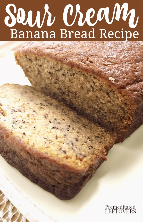 a loaf of banana bread sitting on top of a white plate with the words sour cream banana bread