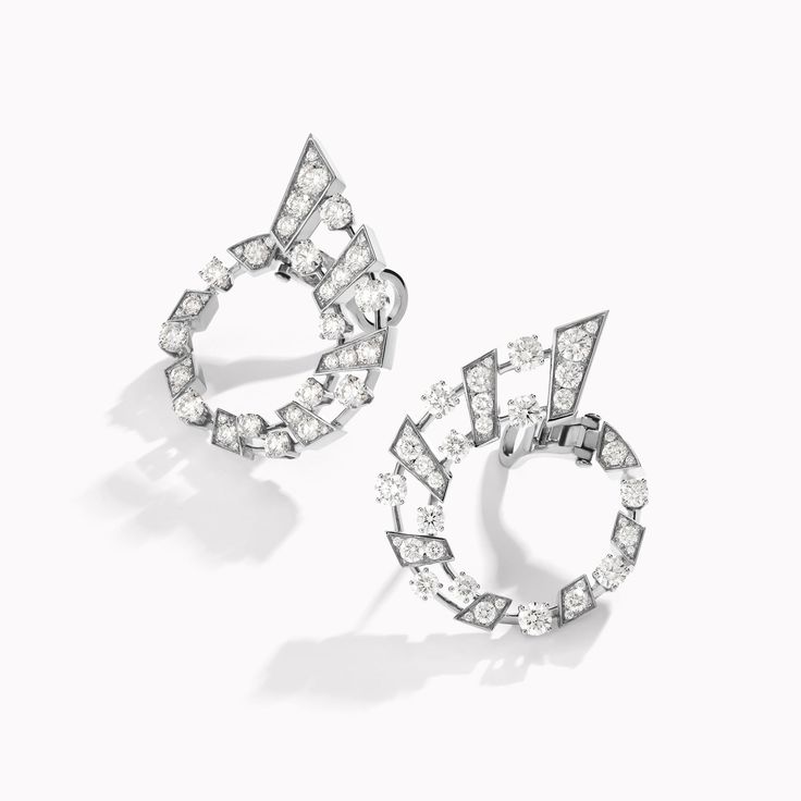 18K Gold Avenues Fifth Ave Diamond Post Earring. Asymmetrical lines and dazzling diamonds create a chic earring which enhances any look. This line draws inspiration from the luxury that is Fifth Ave; quintessential NYC and its pulsating heartbeat. Evening Platinum Diamond Earrings With Single Cut Diamonds, Diamond White Earrings With Single Cut Diamonds For Evening, Evening Diamond Earrings With Single Cut, Diamond Earrings With Single Cut Diamonds For Evening, Evening Earrings With Single Cut Diamonds, Modern Diamond Earrings With Accents For Evening, Single Cut Diamond Drop Earrings For Evening, Modern Diamond Cut Evening Diamond Earrings, Modern Diamond Cut Diamond Earrings For Evening