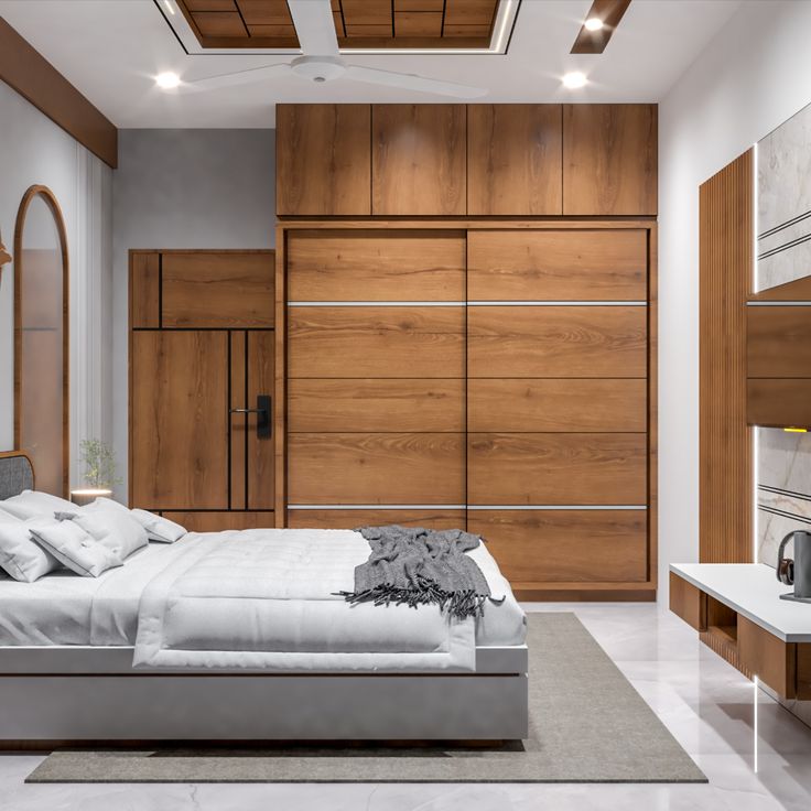 a modern bedroom with wood paneling and white bedding