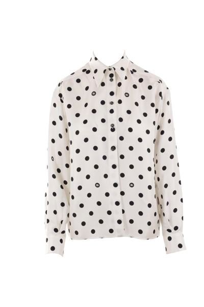 Dolce & Gabbana's shirt crafted in white silk twill with polka-dot print. It features classic collar, button fastening, long sleeves with buttoned cuffs and straight hem.Gender: WOMENMaterial: 100%SILKColor: WHITEMade in: ITProduct ID: F5S31TIS1VIHWZRN*Import tax/duty will be calculated at checkout (If applicable) Elegant Polka Dot Button-up Tops, Elegant Button-up Polka Dot Tops, Elegant Polka Dot Top With Buttons, Long Sleeve Polka-dot Blouse With Button Closure, Polka Dot Long Sleeve Blouse With Button Closure, Elegant Polka Dot Blouse With Buttons, Polka Dot Long Sleeve Shirt For Workwear, Spring Polka Dot Shirt For Work, Polka Dot Shirt With Button Closure For Work