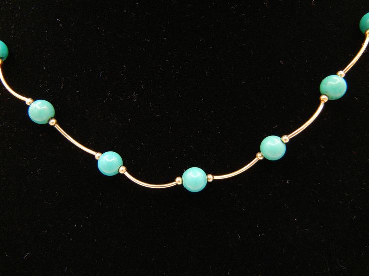 "Turquoise 14k Yellow Gold Necklace Measures 16.5 Inches Long or 42 cm 18 round turquoise beads measuring approximately 6 mm each Total weight: 6.2 Grams 082212-198V FEEL FREE TO MESSAGE ME WITH A BEST OFFER OR IF YOU WISH TO SEE MORE PICTURES! Save money! We combine shipping where you pay only $1.00 more for any additional items on the same order! * Back to Shop Watch and Wares? https://www.etsy.com/shop/watchandwares * Ready to purchase? Click the green button \"Add to cart\" * Have a question Elegant Turquoise Necklace With Gemstone Beads, Elegant Turquoise Gemstone Bead Necklace, Elegant Turquoise Necklace With Round Beads, Elegant Blue Turquoise Necklace With Round Beads, Elegant Turquoise Necklace With Round Beads For Jewelry Making, Elegant Single Strand Turquoise Necklace, Elegant Turquoise Single Strand Necklace, Elegant Turquoise Necklace With Polished Beads, Elegant Single Strand Turquoise Jewelry