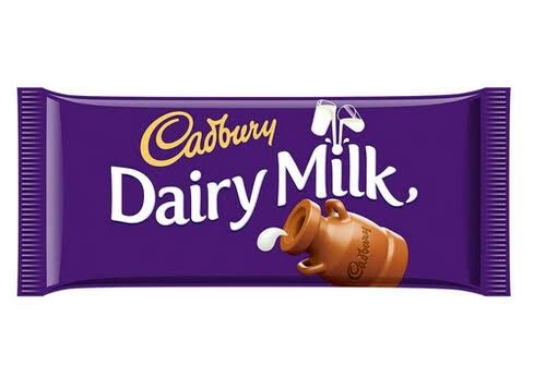 caddy dairy milk bar with chocolate on top