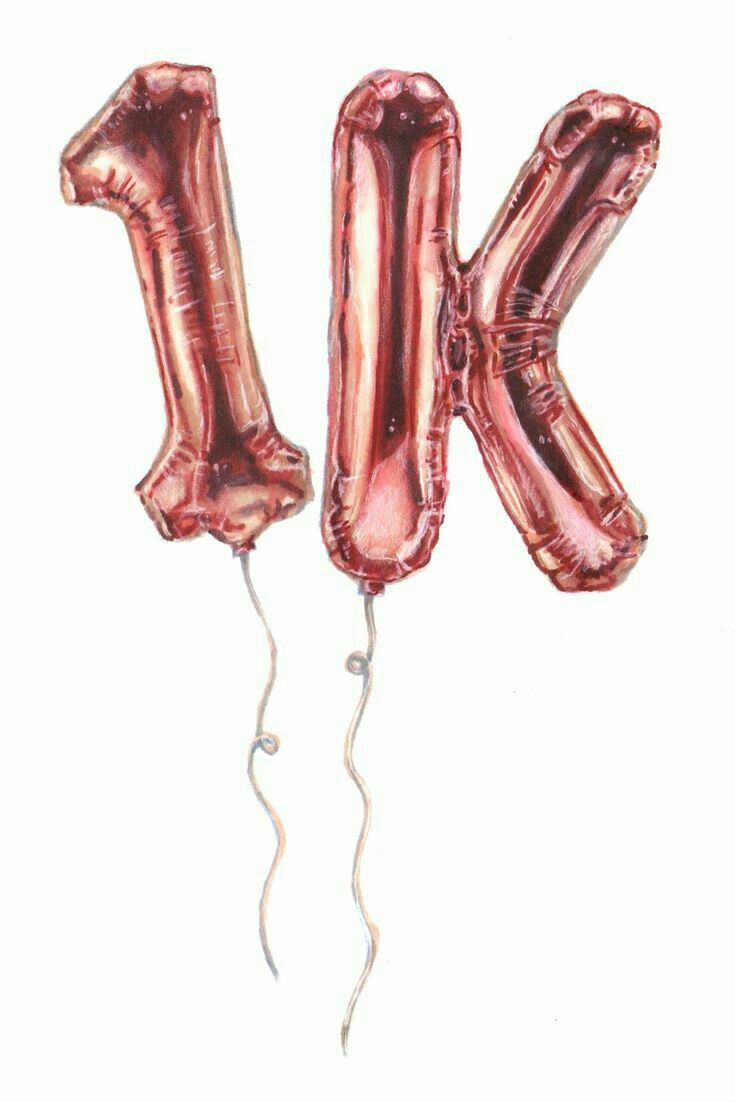 two foil balloons shaped like the letter k