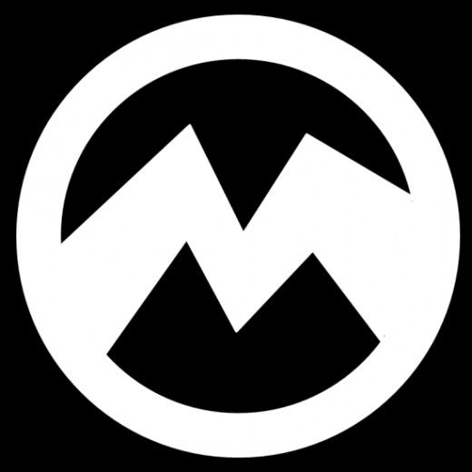 a black and white circle with the letter m in it's center, surrounded by mountains