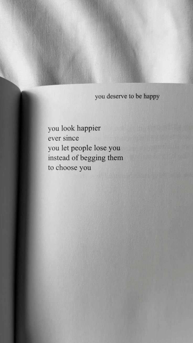 an open book with the words you look happier ever since, and someone else is watching them