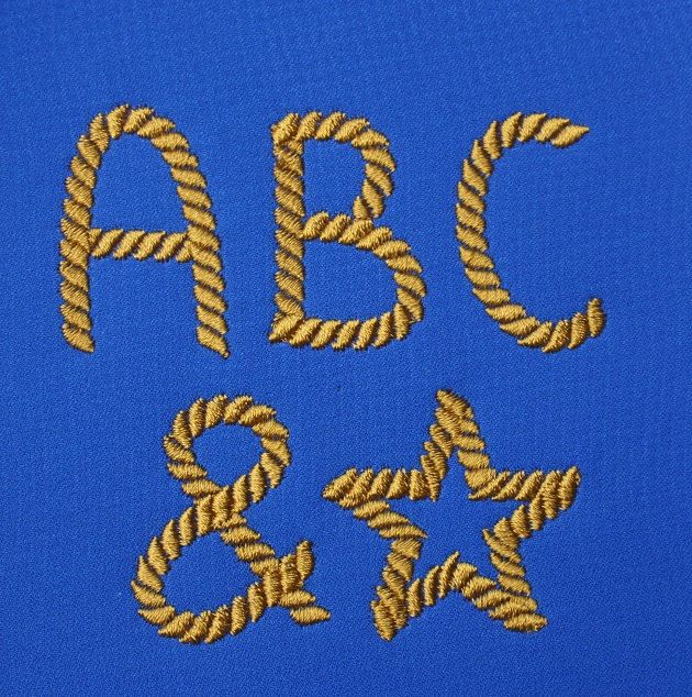 the letters and numbers are made out of braids on a blue background with gold thread