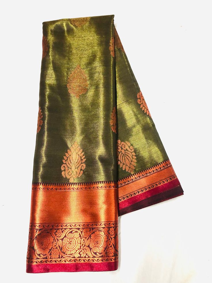 Venkatgiri boota, almond zari chiku zari combination, super soft satin fabric, rich pallu, and blouse. Traditional Chanderi Blouse Piece With Tilla, Silk Traditional Wear With Tilla, Festive Chanderi Blouse Piece With Tilla Details, Diwali Chanderi Blouse Piece With Tilla, Multicolor Banarasi Silk Dupatta With Tilla, Festive Green Traditional Wear With Tilla, Art Silk Blouse Piece With Tilla In Traditional Drape, Green Semi-stitched Traditional Wear With Tilla, Bollywood Style Blouse Piece With Tilla For Festivals