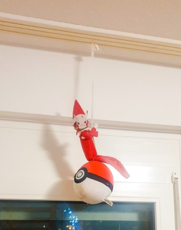 an inflatable toy is hanging from the ceiling