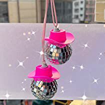 three shiny disco balls hanging from a string