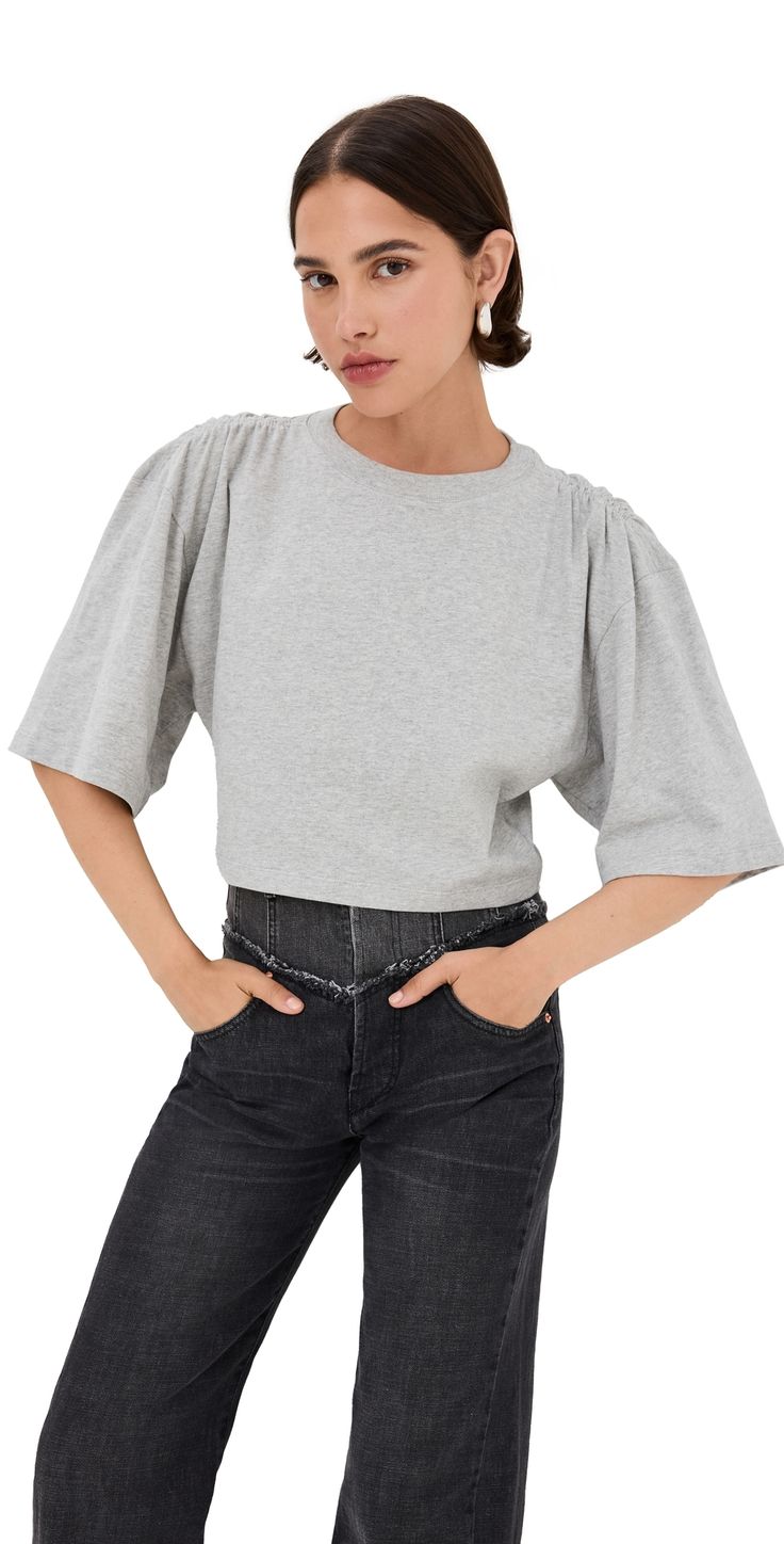 Find ISABEL MARANT ÉTOILE Laurea Tee on Editorialist. Fabric: Lightweight jersey. Ruched shoulders. Cropped length. Crew neck. Elbow-length sleeves. Shell: 100% cotton. Wash cold or dry clean. Made in Portugal. Measurements: Measurements from size XS Length: 17.75in / 45.0cm, from shoulder Casual Oversized Puff Sleeve Tops, Cotton Puff Sleeve Top With Short Sleeves For Fall, Cotton Puff Sleeve Top For Fall, Fall Cotton Puff Sleeve Top With Short Sleeves, Spring Cotton Puff Sleeve Top With Crew Neck, Relaxed Fit Puff Sleeve Tops For Casual Gatherings, Chic Cotton Puff Sleeve Top With Crew Neck, Isabel Marant Etoile, Elbow Length Sleeve