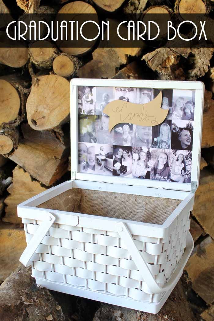 a graduation card box sitting on top of a pile of logs with the words graduation card box above it