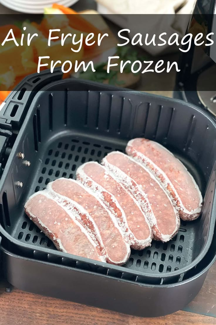 air fryer sausages from frozen meat in an air fryer with text overlay that reads, air fryer sausages from frozen