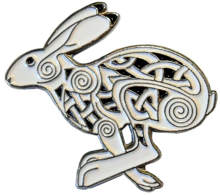 a white rabbit with an intricate design on it's back