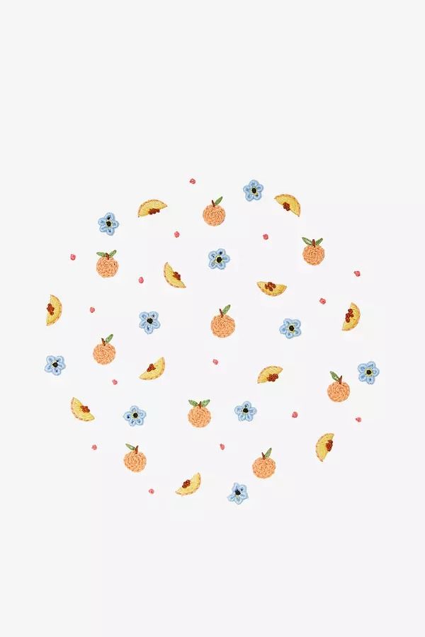 an arrangement of fruit and flowers on a white background