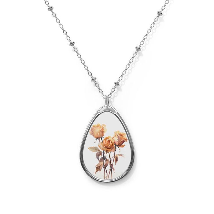 Introducing our June Birth Flower Necklace, a timeless and exquisite piece that captures the elegance and romance of the rose, the birth flower of June. The delicate pendant showcases the intricate details of a blooming rose, beautifully crafted to symbolize love, beauty, and passion. Suspended from a delicate chain, this necklace is a perfect gift for those born in June or anyone who appreciates the timeless allure of the rose. The pendant and its chain are made with robust brass material for dazzling looks that are long-lasting. The print panel is made with aluminum while the pendant itself comes in a unique shape of an ellipse. -Zinc alloy pendant and necklace chain -Ellipse-shaped pendant -White aluminum print surface Personalized Elegant Rose-colored Jewelry, Rose Sterling Silver Necklace For Gift, Delicate Rose Jewelry With Flower Charm, Elegant Flower Charm Necklace With Birth Flower, Feminine Flower Pendant Necklace As Gift For Her, Feminine Necklace With Flower Pendant For Her, Feminine Necklace With Flower Pendant As Gift For Her, Elegant Rose Design Charm Necklace Gift, Feminine Flower Pendant Necklace Gift For Her