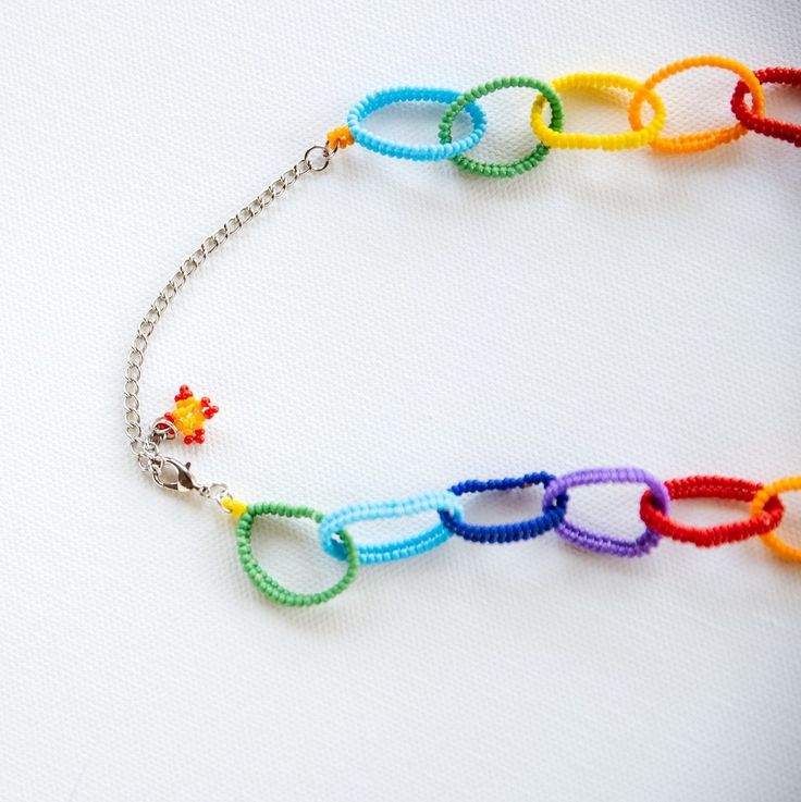 Our rainbow chain necklace is a vibrant and expressive accessory that's perfect for anyone looking to add a pop of color and meaning to their outfit. Crafted with love and designed to spread positivity, this necklace is more than just jewelry – it's a symbol of unity and pride. 🌈 Vibrant Rainbow Beads: Our necklace features a beautiful spectrum of colorful beads, representing the LGBTQ+ pride flag. Each bead is carefully selected to create a harmonious and eye-catching design. 🏳️‍🌈 LGBTQ+ Pride: Show your support for the LGBTQ+ community and proudly wear your colors. This necklace is an ideal accessory for Pride events, rallies, or simply as an everyday reminder of acceptance and love. 🌟 Modern Design: The beaded chain design adds a contemporary touch to this timeless symbol. It's vers Color And Meaning, Lgbtq Pride Flag, Everyday Reminder, Timeless Symbol, Rainbow Necklace, Spread Positivity, Rainbow Beads, Eyeglass Chain, Chain Design