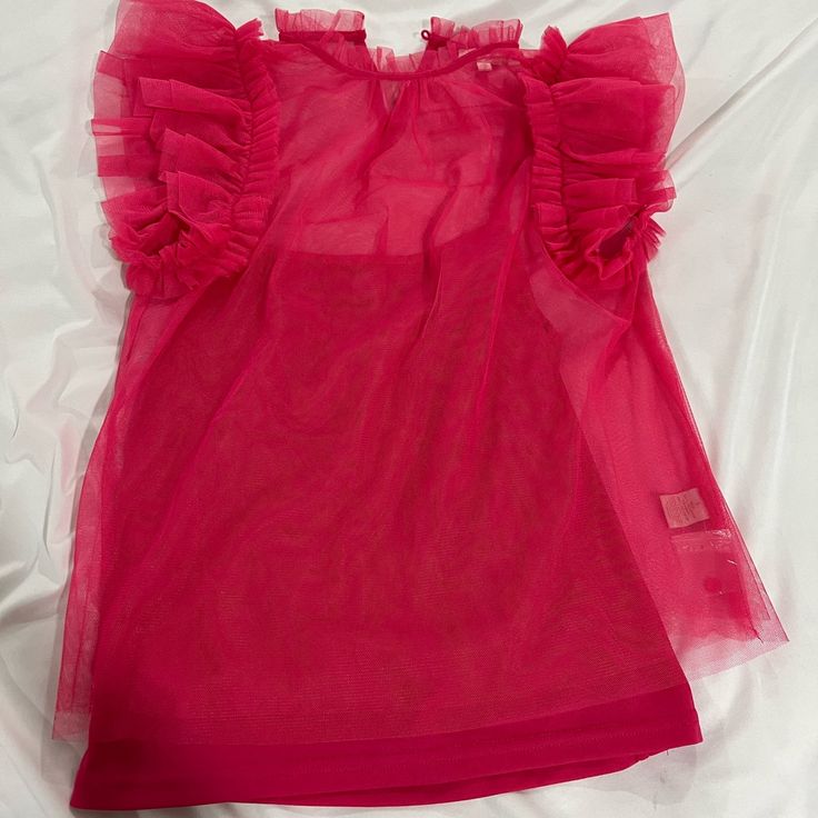 Never Worn Size Small Flying Tomato Pink Top. Top Is A Spaghetti Strap With A See Through Layer With Cute Ruffled Sleeves. Such A Cute Top In Person. Summer Party Blouse With Ruffles, Summer Sheer Blouse For Brunch, Sheer Blouse For Summer Brunch, Summer Party Tops With Ruffles, Flirty Pink Summer Blouse, Chic Pink Mesh Top For Spring, Flirty Summer Blouse With Ruffles, Flirty Ruffled Summer Blouse, Fitted Summer Mesh Top With Ruffles