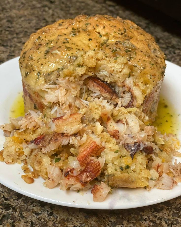 a white plate topped with meat and stuffing