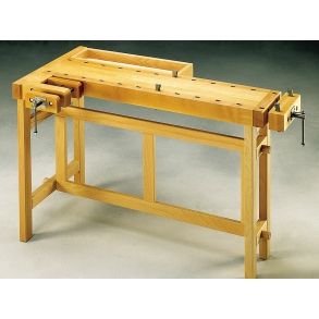 a wooden workbench with tools on it