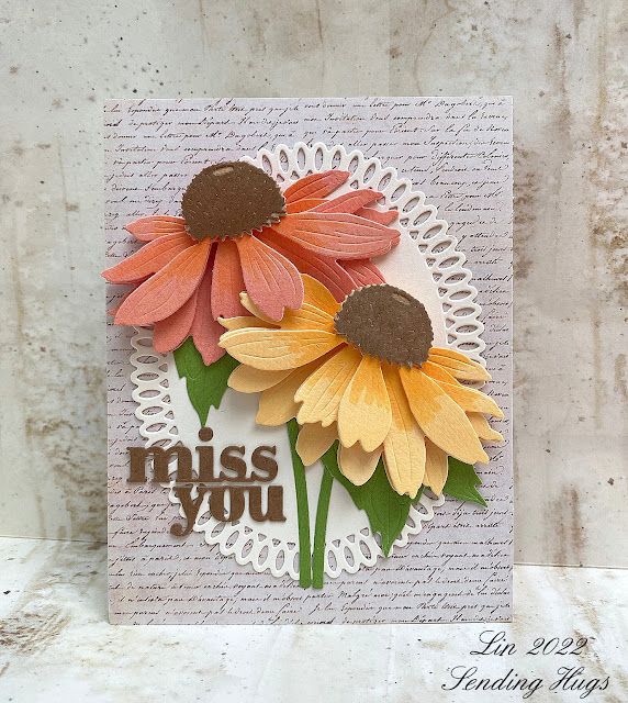 a close up of a card with flowers on it