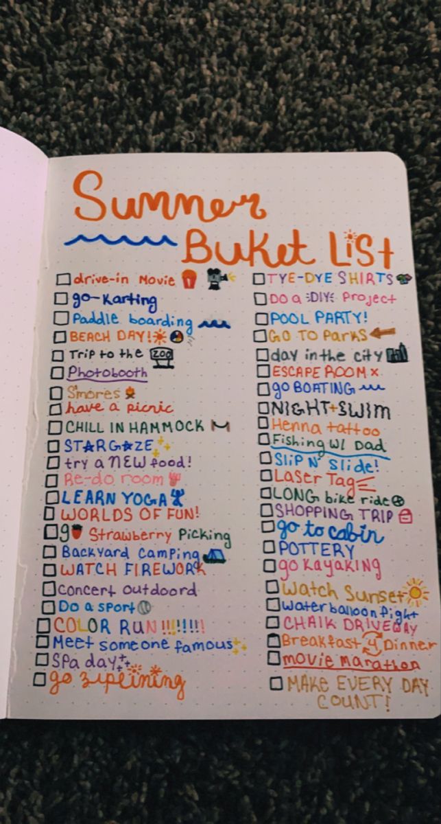 an open notebook with writing on it and the words summer bucket list written in orange