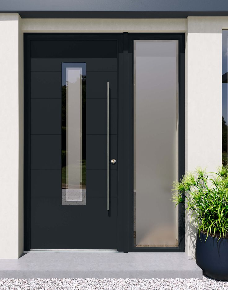 a black front door with two side panels