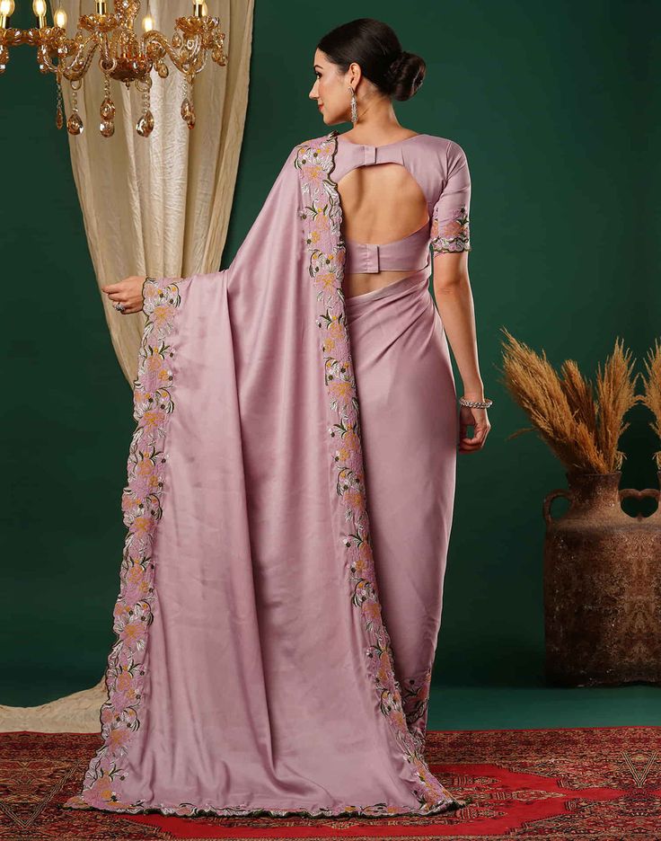 Dusty Pink Embroidery Satin Saree  Dusty Pink Embroidery Satin Saree is a glamorous and luxurious piece. The rich satin fabric drapes beautifully, creating a flowing and elegant silhouette.  Features Of Dusty Pink Embroidery Satin Saree  Traditional Handloom Craft  Intricate Gold Brocade Work  Durability and Longevity   Size Fit  The model height is 5.7 ft   WASH AND CARE  Hand Wash only. Do not dry in direct sunlight    Legal Disclaimer:  The product is guaranteed to be 100% genuine. Product im Reception Saree With Embroidered Border In Pink, Party Pre-draped Art Silk Saree With Embroidered Border, Party-ready Pre-draped Art Silk Saree With Embroidered Border, Party Pre-draped Saree With Embroidered Border, Elegant Embroidered Art Silk Pre-draped Saree, Satin Pre-draped Saree With Pallu For Wedding, Wedding Satin Pre-draped Saree With Pallu, Semi-stitched Satin Saree With Traditional Drape, Semi-stitched Satin Saree In Traditional Drape