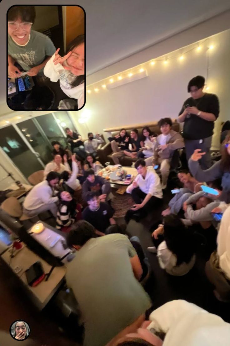 a group of people sitting around each other in a room