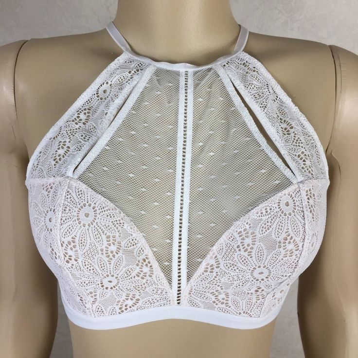 White And Nude Lace Bralette By Victoria’s Secret. New With Tags. Underwire And Padding Free For Comfort. This Style Has A Back Closure With Convertible Straps That Can Be Pulled In At The Middle Or Worn Normal.. This Style Has Been Discontinued By Vs And Will Soon Be Impossible To Find. New With Tags Price Firm Ship Daily Except Weekends V01812009 Fitted White Lace Bra, White Delicate Lace Fitted Bra, Elegant White Summer Bra, White Halter Neck Top, Bra-friendly, White Halter Neck Top Bra Friendly, White Halter Neck Top With Bra-friendly Design, Feminine White Bra-friendly Top, Feminine Bra Friendly White Tops, Feminine White Bra For Party